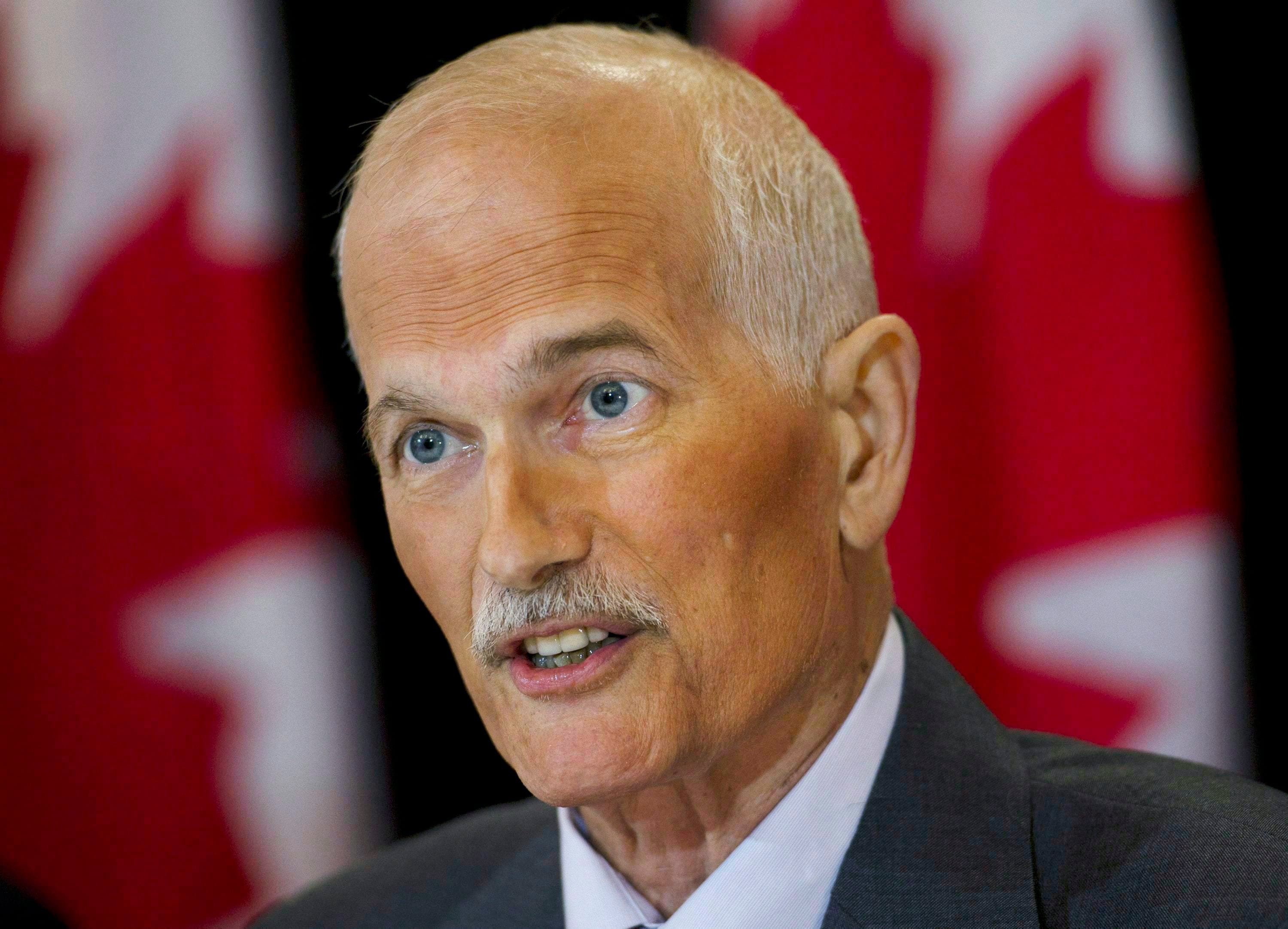 NDP Leader Jack Layton speaks at a new conference in Toronto on Monday, July 25, 2011. Layton will not attend a special NDP caucus retreat to plot strategy for September's resumption of Parliament. (Nathan Denette/CP)