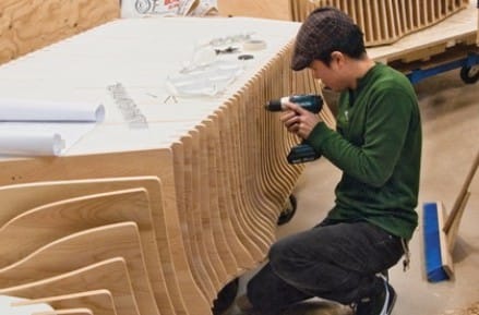 UBC Wood Processing students at the Rona fabrication shop putting together the podia used at the 2010 Olympic ceremonies 