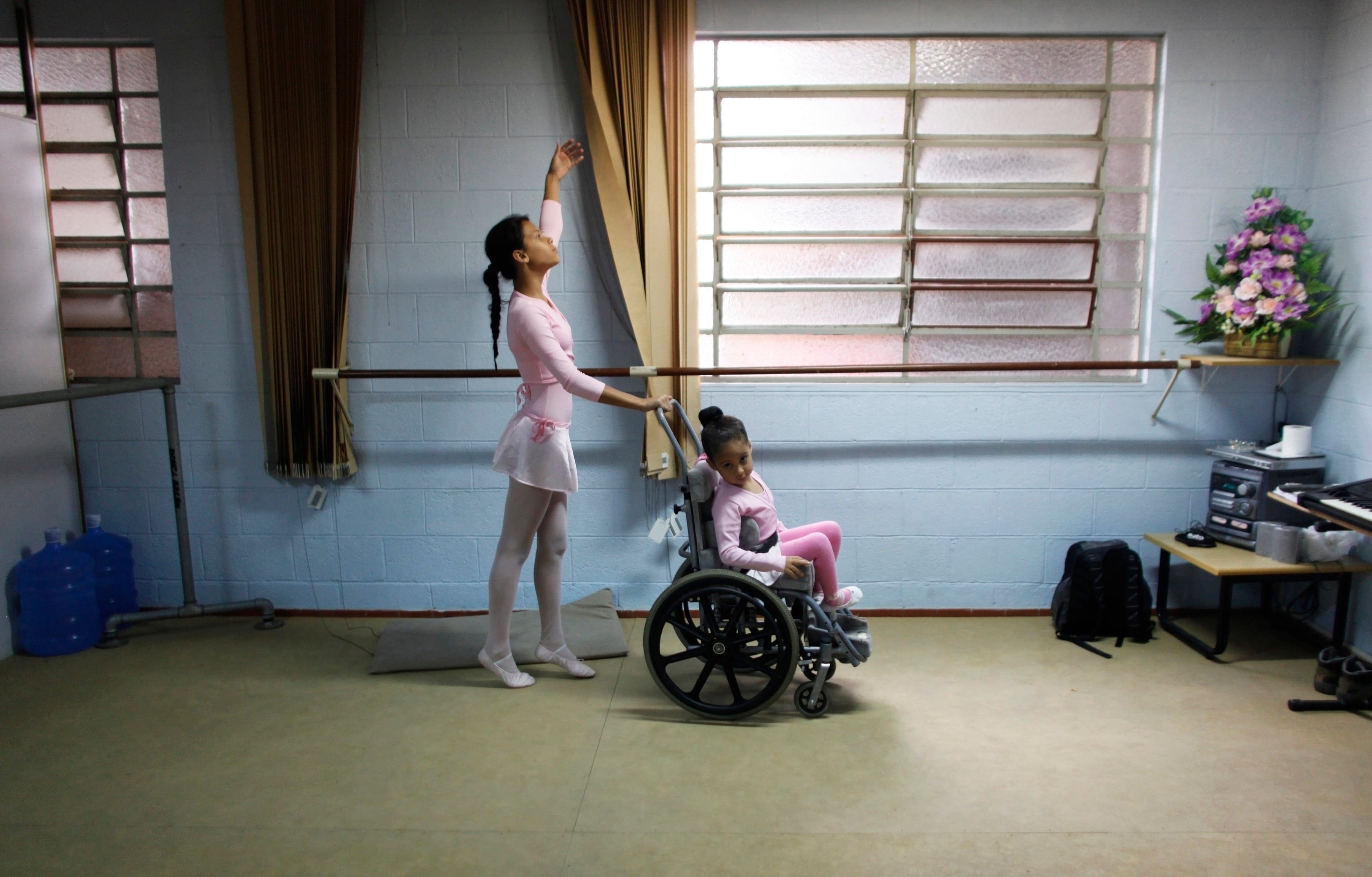 Vitoria Torres and her handicapped classmate Julia Carruci rehearse Don Quixote