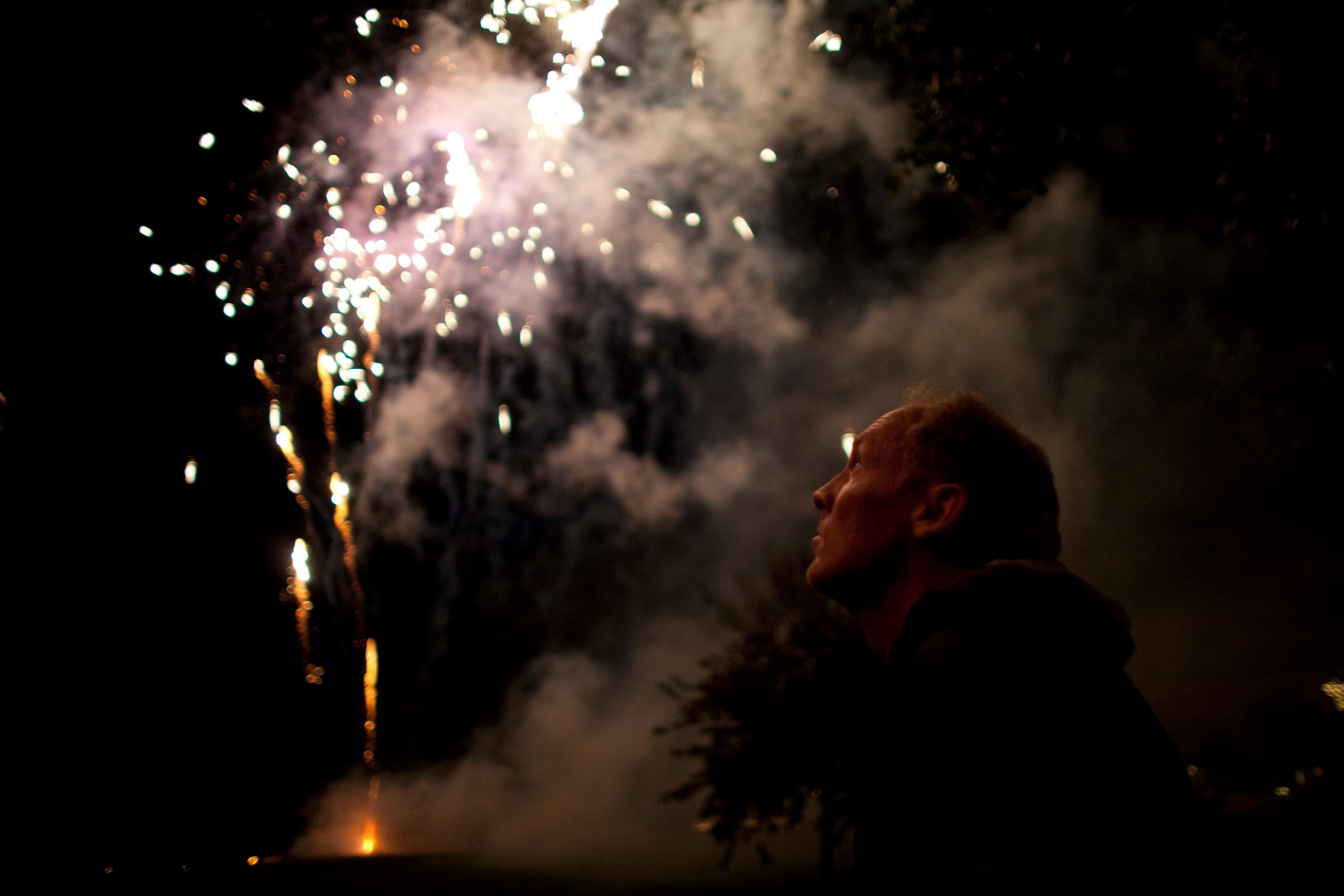 GFA Pyrotech Hugues Lalonde watches the show on St. Jean Baptiste Day from a nearby field, in Quebec (Liam Maloney/Omni Film)