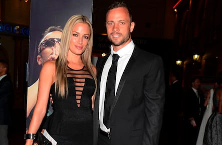Oscar Pistorius and his girlfriend Reeva Steenkamp pose for a picture in Johannesburg