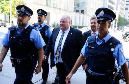 .Pics of . Mayor Rob Ford returns to university court house after lunch break accompanied in by cour
