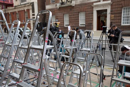 Photographers and television crews mark out positions in front of the door to the Lindo Wing of St Mary's Hospital, where Britain's Catherine, Duchess of Cambridge is due to give birth in central London. (Neil Hall/Reuters)