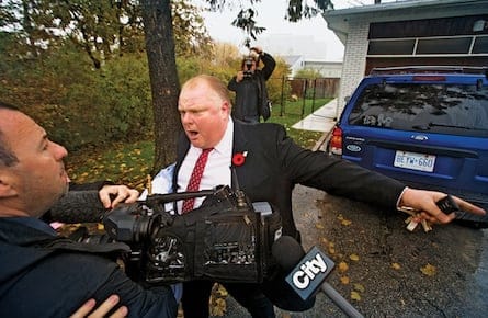 Toronto Mayor Ford yells at reporters and photographers to get off of his property in front of his house in Toronto