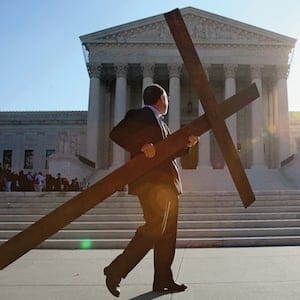 Activists Pray In Front Of Supreme Court During Oral Arguments