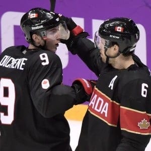 Canada defenceman Shea Weber (6) is congratulated by teammate Matt Duchene (9) after scoring on Austria during first period round robin men's hockey action at the Sochi Winter Olympics on Friday, Feb. 14, 2014 in Sochi, Russia. (Nathan Denette/The Canadian Press)
