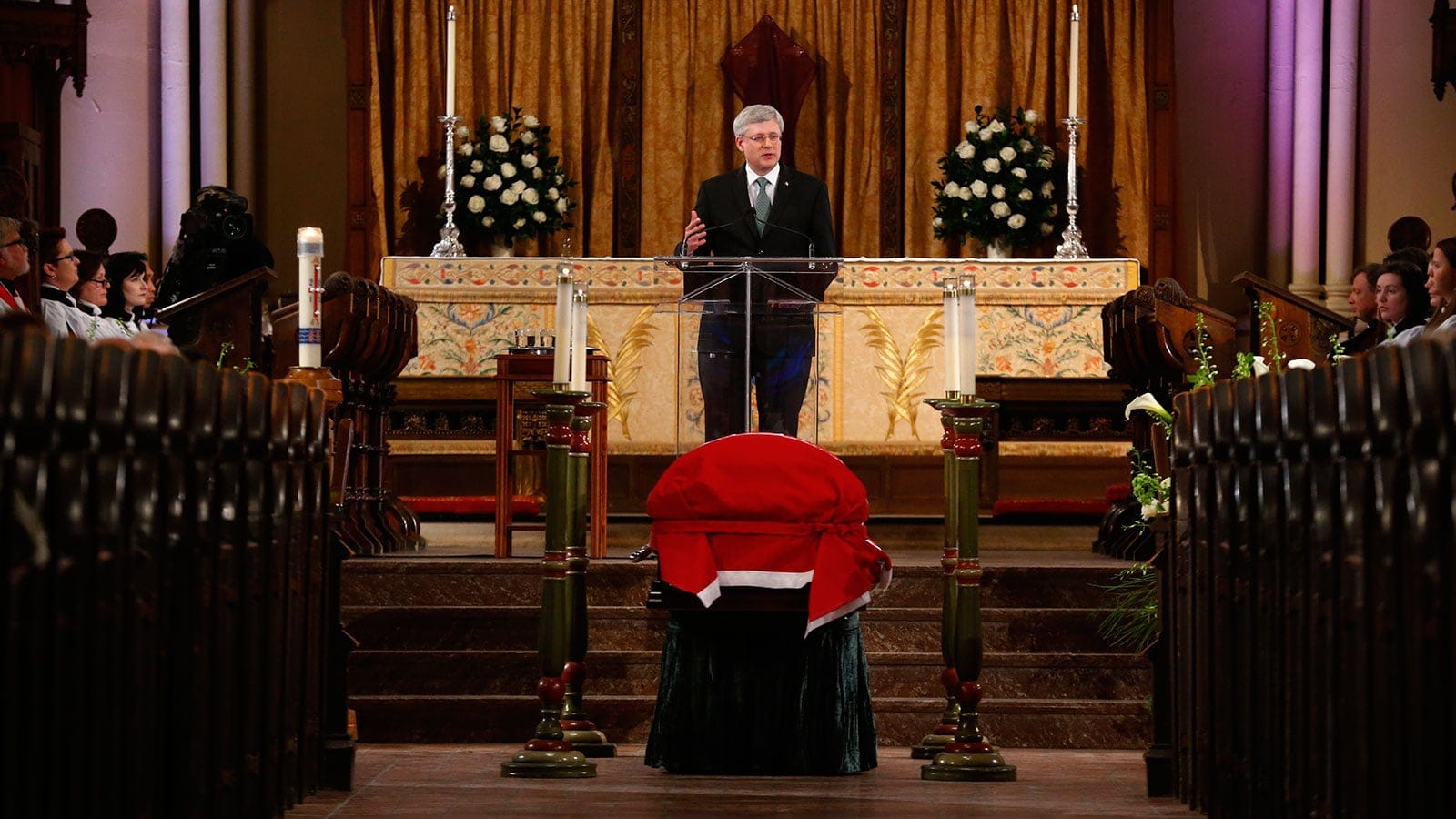 Canada's Prime Minister Stephen Harper speaks at the state funeral for former finance minister Jim Flaherty in Toronto,  April 16, 2014. REUTERS/Mark Blinch (CANADA  - Tags: POLITICS OBITUARY)   - RTR3LKLO