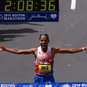 Meb Keflezighi of the U.S. reacts as he wins the men's division at the 118th running of the Boston Marathon