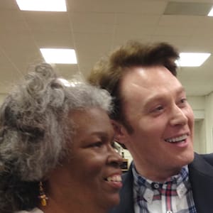 Democratic nominee Clay Aiken takes a pictures with a constituent after a campaign forum in Cary, North Carolina