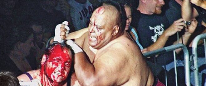 Devon Nicholson and Abdullah the Butcher fight at the Ottawa Civic Centre in 2007. (Darren Brown/QMI; Courtesy of Devon Nicholson)