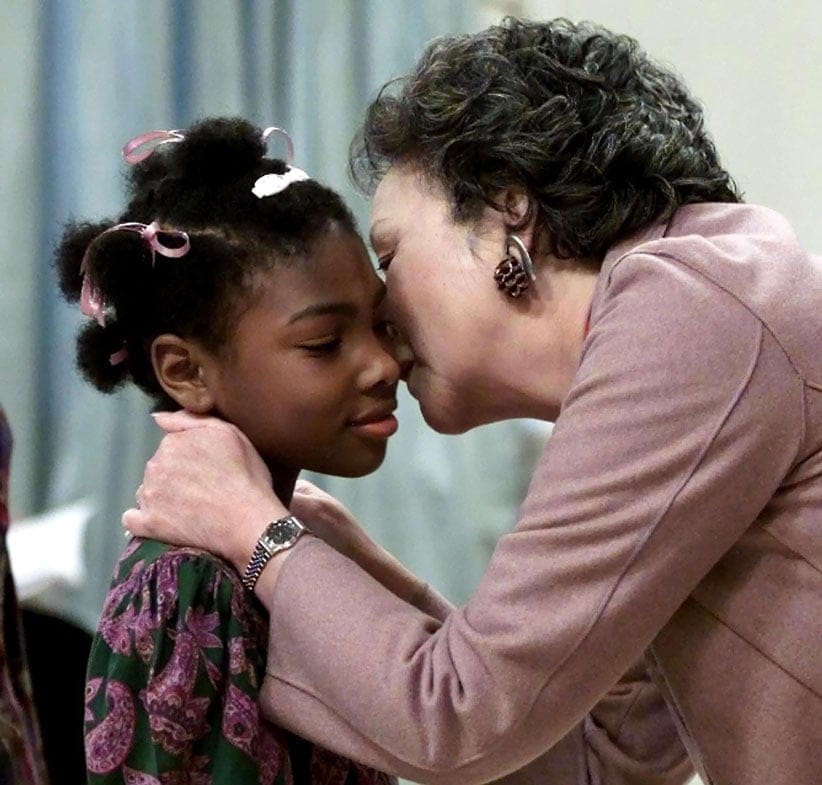 Marie-Helene Etienne-Rousseau, of Sainte-Jeanne-D'Arc-de-Lefebvre, Que, is kissed by Governor General Adrienne Clarkson after Etienne-Rousseau was decorated with Medal of Bravery at Rideau Hall in Ottawa, Friday, December  8, 2000. (Fred Chartrand/CP)