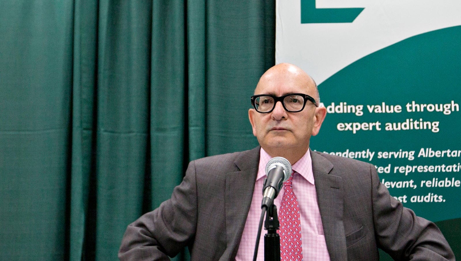 Alberta auditor general Merwan Saher discusses his report on travel expenses and government aircraft involving former premier Alison Redford in Edmonton, Alberta on Thursday Aug 7, 2014. THE CANADIAN PRESS/Jason Franson