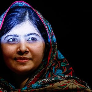 Pakistani schoolgirl Malala Yousafzai leaves after speaking at Birmingham library in Birmingham