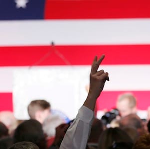 Republican supporters cheer as a giant TV screen displays the results of the midterm elections in Denver, Colorado