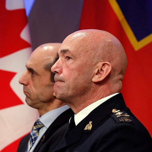RCMP Commissioner Paulson takes part in a news conference with Canada's Public Safety Minister Blaney in Ottawa
