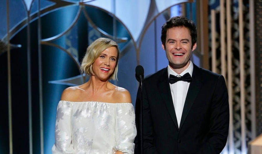 Kristen Wiig, left, and Bill Hader present an award at the 72nd Annual Golden Globe Awards. (AP Photo/NBC, Paul Drinkwater)