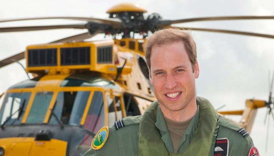Prince William poses in front of a Sea King helicopter at RAF Valley in Anglesey Wales on June 1, 2012. (CP/AP, SAC Faye Storer, MOD)