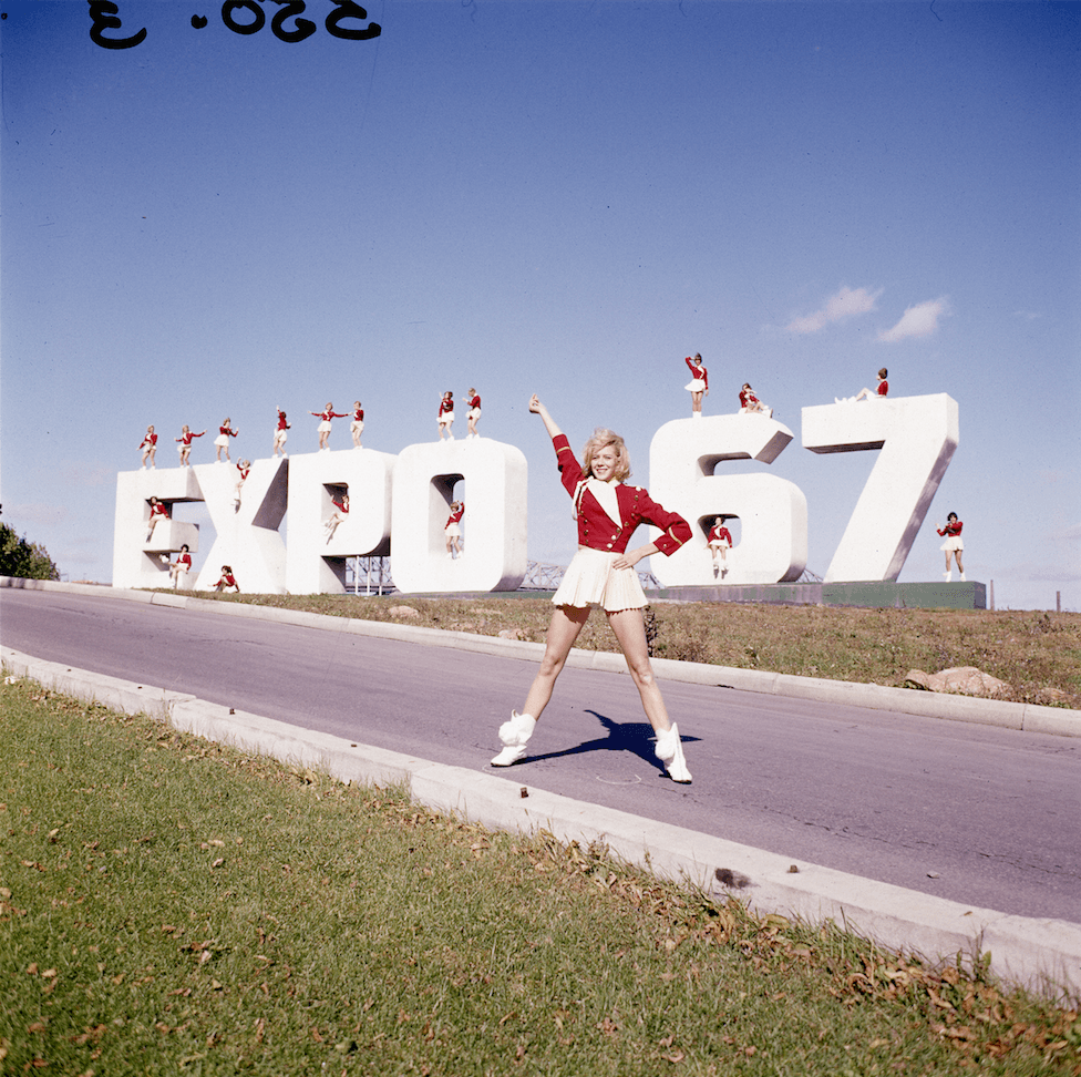 What we know: Majorettes pose with the entrance sign for the Expo 67 world fair held in Montreal.

What we need: Help us locate any of the Majorettes pictured.

(Mikan/Library and Archives Canada)