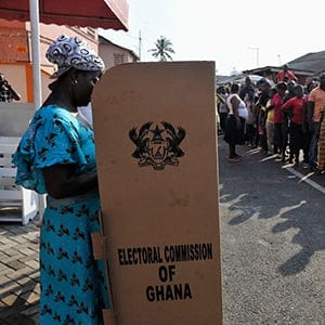A woman votes during presidential elections in Accra