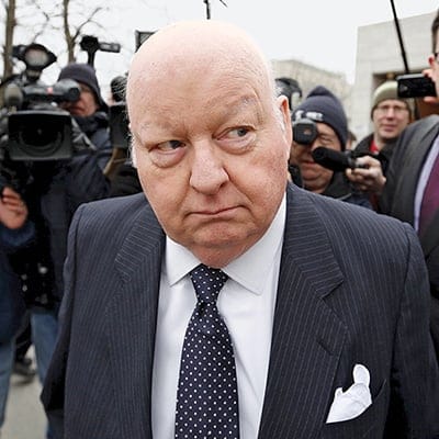 Suspended Senator Mike Duffy leaves the Ontario Court of Justice, in Ottawa, Canada, April 8, 2015. Duffy, a former ally of Canadian Prime Minister Stephen Harper, is on trial for fraud and bribery in a high-profile case that could hurt the ruling Conservatives' chances of winning an election this October. Blair Gable/Reuters