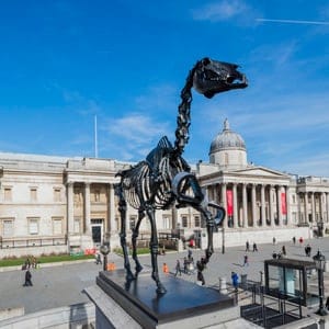 Gift Horse by Hans Haacke is unveiled by The Mayor of London, Boris Johnson, as the tenth commission for the Fourth Plinth in Trafalgar Square, 5 Mar 2015, London. The sculpture portrays a skeletal, riderless horse ? a ?wry? comment on the equestrian statue of William IV originally planned for the plinth. Tied to the horse?s front leg is an electronic ribbon displaying live the ticker of the London Stock Exchange, completing the link between power, money and history. The horse is derived from an engraving in the Anatomy of a Horse of 1766 by George Stubbs; the famous English painter whose works are represented in the National Gallery at Trafalgar Square. Hans Haacke is one of Germany?s most important contemporary artists, known for his installations in the Reichstag in Berlin, and for taking a sledgehammer to the floor of the German Pavilion at the 1993 Venice Biennale in protest against the building?s Nazi-style architecture. (Camera Press/Redux)