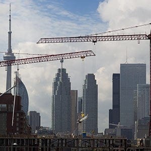 Construction work continues on condominiums in the Canary District  in Toronto on Oct. 17, 2013. The buildings will be used to house athletes during the Pam Am 2015 Toronto games. Peter Power/The Globe and Mail/CP