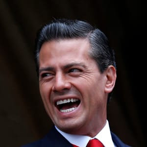 Mexico's President Enrique Pena Nieto smiles during a military parade celebrating Independence Day at Zocalo Square in downtown Mexico City, September 16, 2014.  Edgard Garrido/Reuters