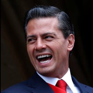 Mexico's President Enrique Pena Nieto smiles during a military parade celebrating Independence Day at Zocalo Square in downtown Mexico City, September 16, 2014.  Edgard Garrido/Reuters