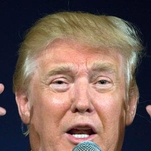 Republican presidential hopeful Donald Trump remarks about Texas Gov. Rick Perry's glasses at his South Carolina campaign rally in Bluffton, S.C., Tuesday, July 21, 2015.  (AP Photo/Stephen B. Morton)