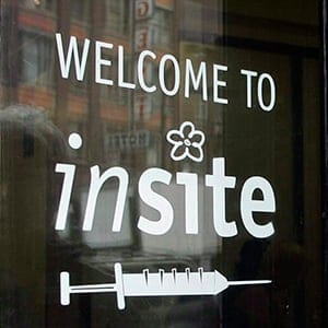 Marc Townsend, manager of the Portland Hotel Society, enters Insite, Canada's only safe injection site for intravenous drug addicts in Vancouver, Tuesday, October 2, 2007. The society along with Vancouver Coastal Health Authority operates the site which was given a six-month operating extension by the federal government Tuesday. Richard Lam/CP