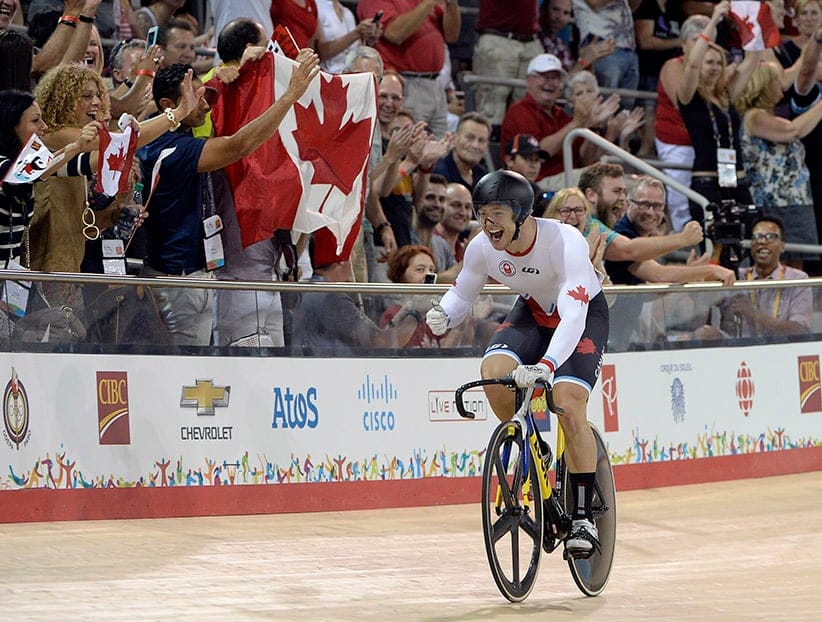 Jul 18, 2015; Milton, Ontario, CAN; Hugo Barrette of Canada celebrates winning the gold medal in the men's spring final during the 2015 Pan Am Games at Milton Pan Am Velodrome. (Eric Bolte/USA Today Sports/Reuters)