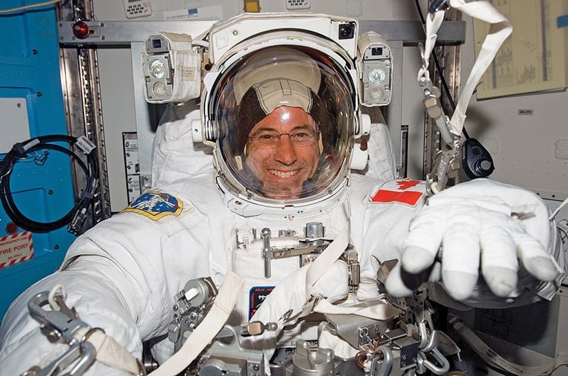 View of STS-118 Canadian Space Agency Astronaut and Mission Specialist (MS), Dafydd Williams, attired in his Extravehicular Mobility Unit (EMU) in the Quest/Airlock (A/L) after a session of Extravehicular Activity (EVA). NASA Identifier: s118e06867. NASA