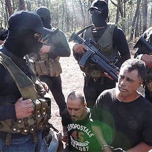 Members of the Jalisco New Generation cartel (CJNG) record themselves with prisoners from a rival cartel.  YouTube