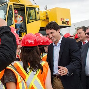 Liberal leader Justin Trudeau greets apprentices while touring a crane operator training facility Thursday, August 27, 2015 in Oakville, Ont. (Paul Chiasson/CP)