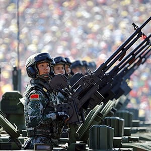 Soldiers of the People's Liberation Army (PLA) of China arrive on their armoured vehicles at Tiananmen Square during the military parade marking the 70th anniversary of the end of World War Two, in Beijing, China, September 3, 2015 (Damir Sagolj/Reuters)