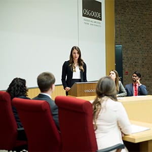 MACLEANS-MOOTING-09.14.15-TORONTO, ON: (left to right) Kelsey Bishop, Paulina Bogdanova, and Raphael Jacob, Jurisdoctor law students, participate in a simulated court procedure at the York University Osgood Hall Law School mooting program. (Photograph by Cole Garside)