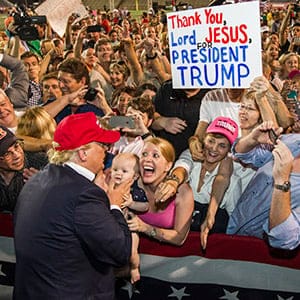 MOBILE, AL- AUGUST 21: Republican presidential candidate Donald Trump greets supporters after his rally at Ladd-Peebles Stadium on August 21, 2015 in Mobile, Alabama. The Trump campaign moved tonight's rally to a larger stadium to accommodate demand. (Mark Wallheiser/Getty Images)
