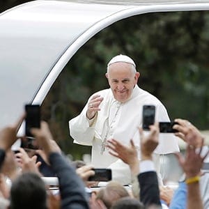 PHILADELPHIA, PA - SEPTEMBER 27:  Pope Francis acknowledges faithful as he parades on his way to celebrate Sunday Mass at Benjamin Franklin Parkway September 27, 2015 in Philadelphia, Pennsylvania. Pope Francis concludes his tour of the U.S. with events in Philadelphia on Saturday and Sunday. 
Matt Rourke/Getty Images