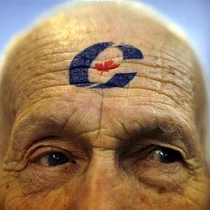 Supporter George Feltham sports the party logo during a rally for Conservative leader and Canada's Prime Minister Stephen Harper (not pictured) in Guelph, Ontario October 11, 2008. Canadians will head to the polls in a federal election on October 14. (Chris Wattie/Reuters)