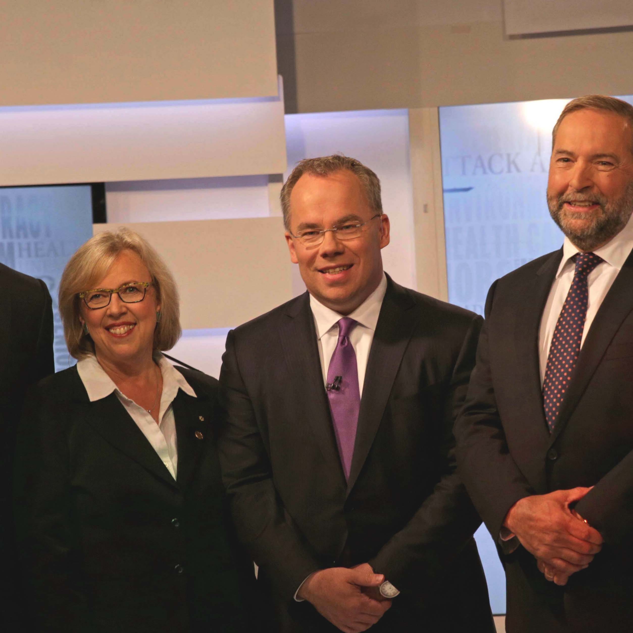 The federal party leaders pose for a rgoup protrait with mediator Paul Wells ahead of the Maclean's Leaders Debate, on August 6th, 2015, in TOronto. (Photograph by Dillan Cools)