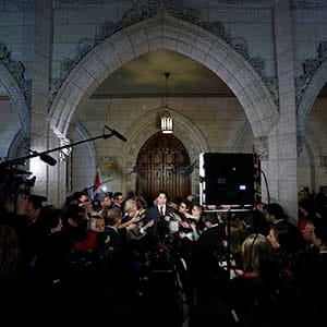 Liberal leader Justin Trudeau speaks to journalists in the foyer of the House of Commons on Parliament Hill in Ottawa April 15, 2013.   (Chris Wattie/Reuters)