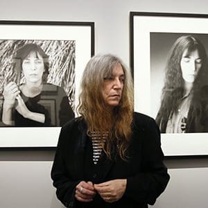 US singer and songwriter Patti Smith poses during the opening of an exhibition dedicated to the late US photographer Robert Mapplethorpe at the Grand Palais in Paris on March 24, 2014.   AFP PHOTO / PATRICK KOVARIK
RESTRICTED TO EDITORIAL USE, MANDATORY MENTION OF THE ARTIST UPON PUBLICATION, TO ILLUSTRATE THE EVENT AS SPECIFIED IN THE CAPTION        (Photo credit should read PATRICK KOVARIK/AFP/Getty Images)