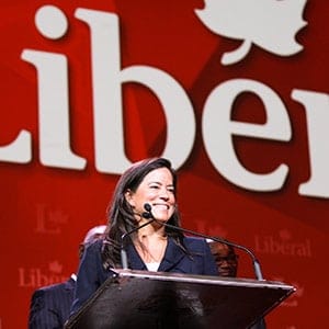 Jody Wilson-Raybould addresses the crowd with her co-chairs.  Adam Scotti/Liberal Party;