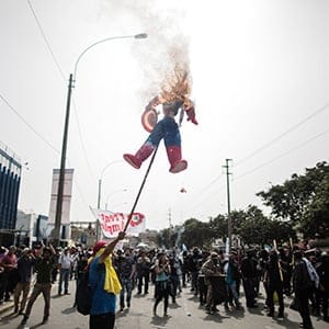 LIMA, PERU - OCTOBER 09:  Demonstrators stage a protest against the Annual Meetings of World Bank Group (WBG) and International Monetary Fund (IMF) taking place in Lima, Peru on October 09, 2015. (Sebastian Castaneda /Anadolu Agency/Getty Images)