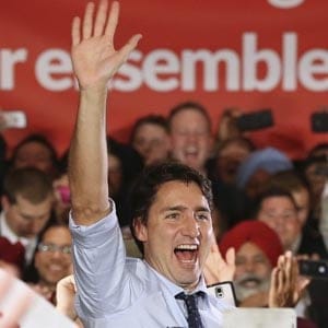 Liberal leader Justin Trudeau waves during a campaign rally in Calgary, Alberta, October 18, 2015. Canadians will go to the polls in a federal election on October 19. (Chris Wattie/Reuters)