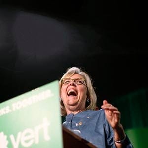Green Party leader Elizabeth May, speaks to volunteers, campaign staff and supporters, after finding out she's been re-elected during election night at the Victoria Conference Centre in Victoria, B.C., Monday, October 19, 2015. (CHAD HIPOLITO/CP)