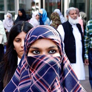 Zunera Ishaq talks to reporters outside the Federal Court of Appeal after her case was heard on whether she can wear a niqab while taking her citizenship oath, in Ottawa on Tuesday, September 15, 2015. (PATRICK DOYLE/CP)
