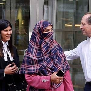 Zunera Ishaq, second from right, leaves the Federal Court of Appeal after her case was heard on whether she can wear a niqab while taking her citizenship oath, in Ottawa on Tuesday, September 15, 2015. (PATRICK DOYLE/CP)