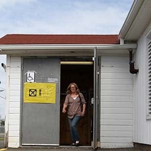 People leave a polling station in Point-du-Chene, New Brunswick as Canada goes to the polls for the federal election on Monday May 2, 2011. (Cole Burston/CP)