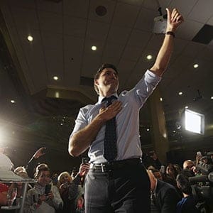 Liberal leader Justin Trudeau gestures as he arrives on stage during a campaign rally in Edmonton, Alberta, October 18, 2015. Canadians will go to the polls in a federal election on October 19. (Chris Wattie/Reuters)